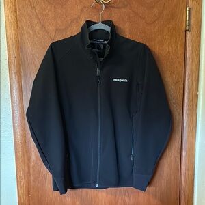 Patagonia Polartec Black Performance Jacket with Zipper pockets.